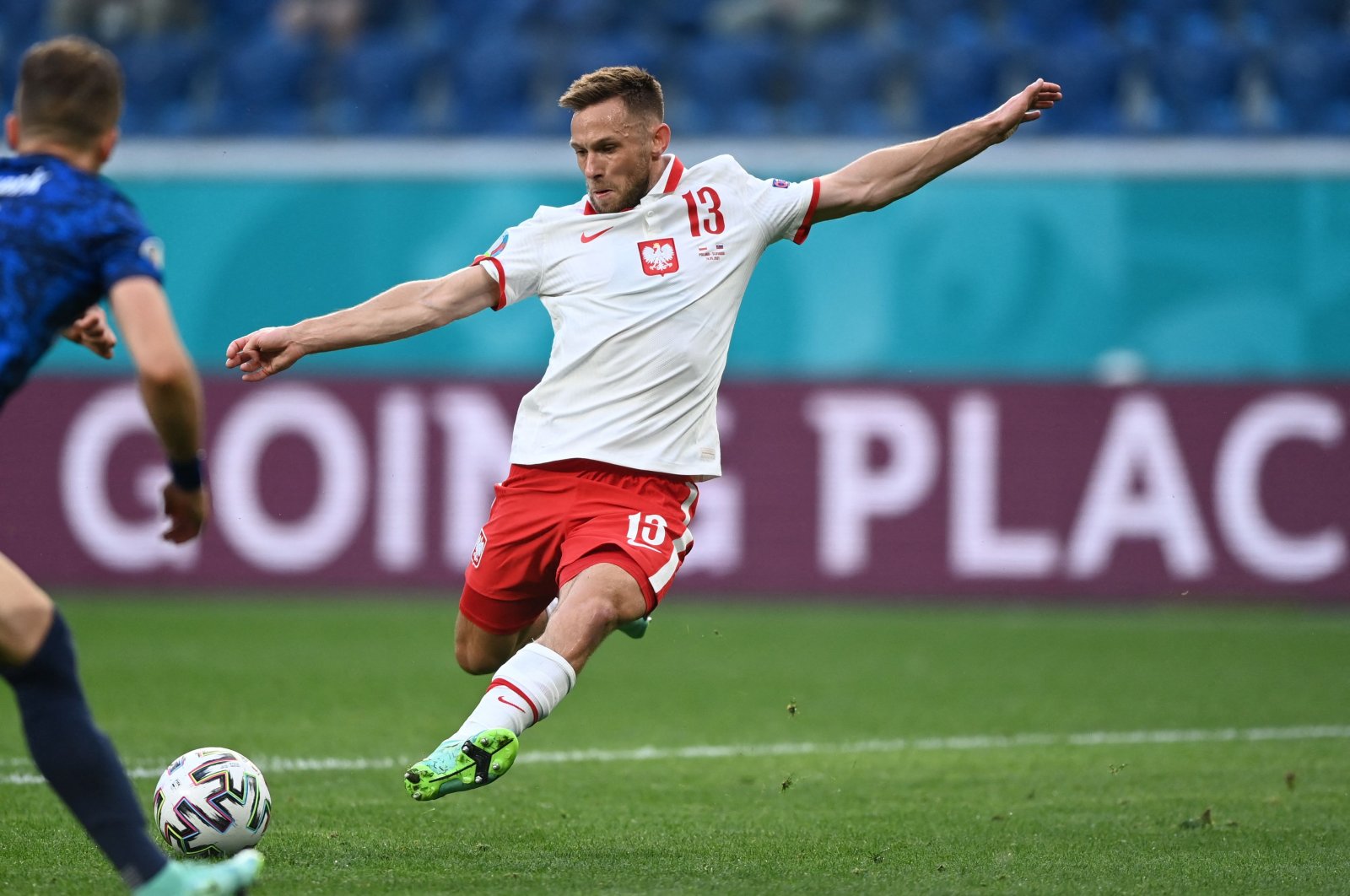 Poland&#039;s defender Maciej Rybus in action during a UEFA Euro 2020 match against Slovakia, St. Petersburg, Russia, June 14, 2021. (AFP Photo)