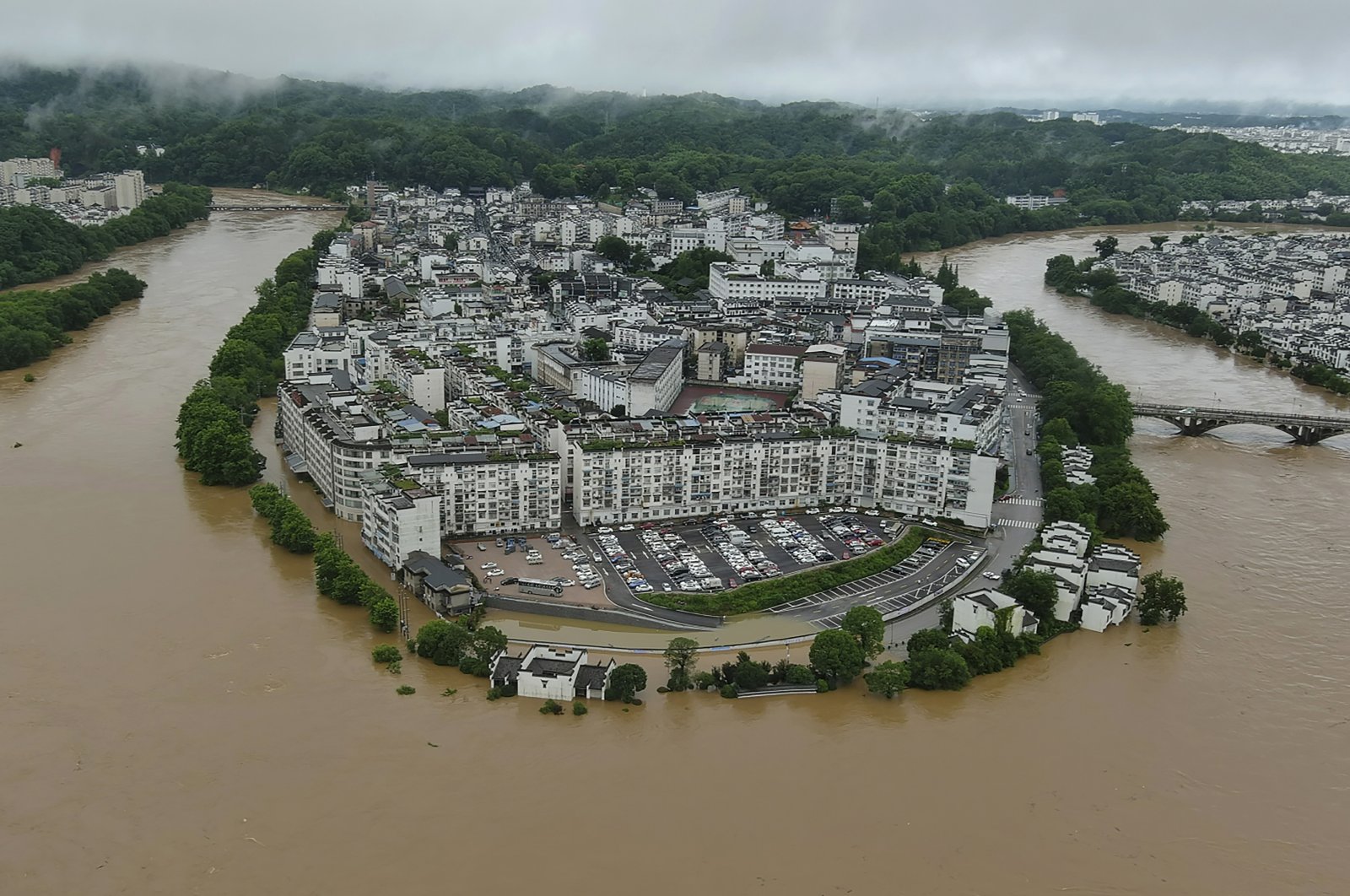 An aerial photo shows flooded areas of Wuyuan county, Jiangxi, southeastern China, June 20, 2022. (Xinhua via AP)
