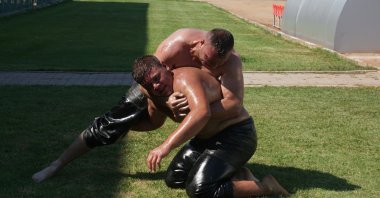 Local wrestlers train for the 661st Historic Kırkpınar Oil Wrestling championship, Edirne, northwestern Turkey, June 22, 2022. (IHA Photo)