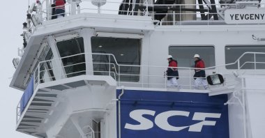 The logo of Russian state shipping company Sovcomflot is seen on the multifunctional icebreaking standby vessel "Yevgeny Primakov" moored in central St. Petersburg, Russia, Feb. 3, 2018. (Reuters Photo)