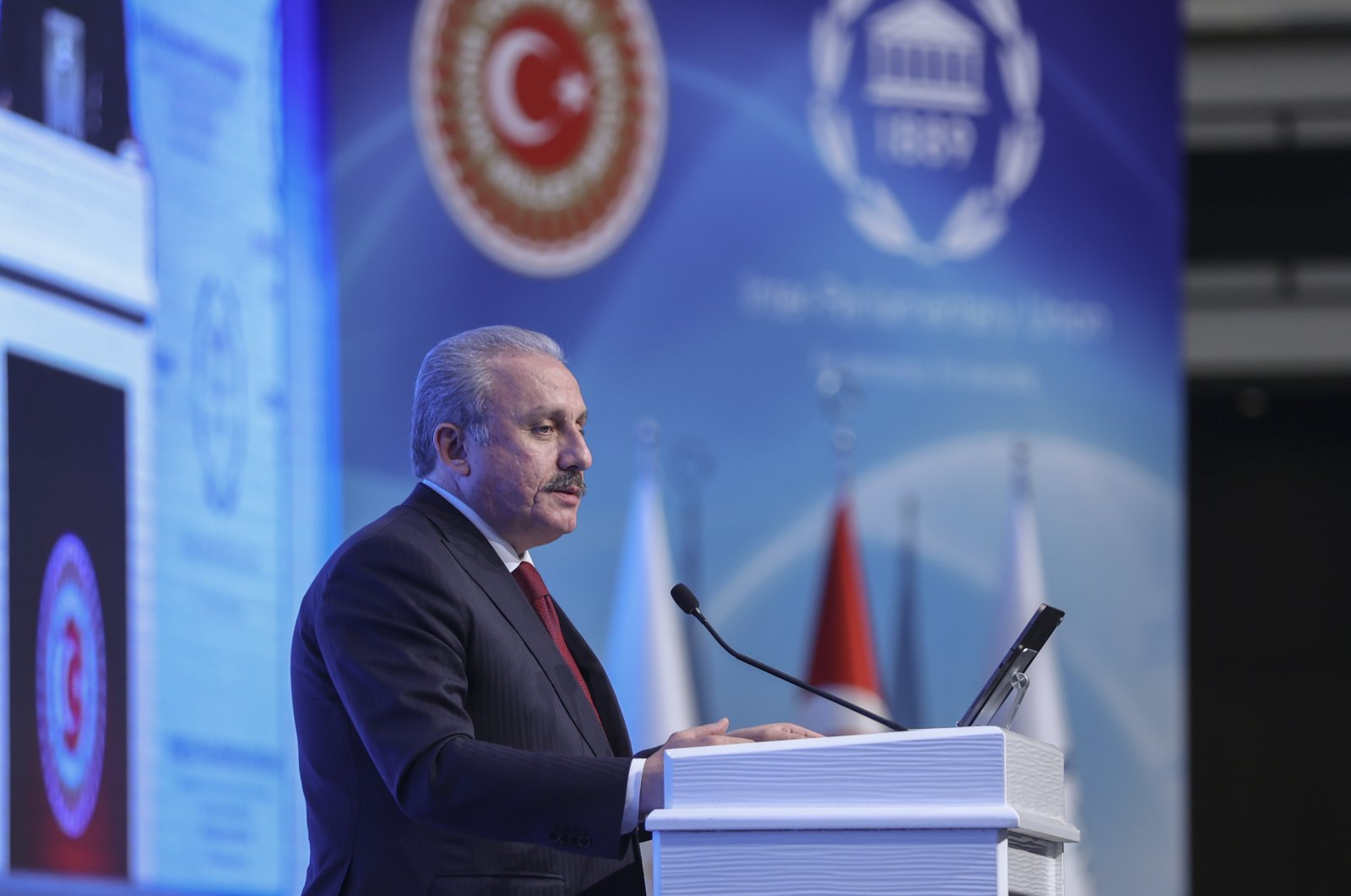 Parliament Speaker Mustafa Şentop speaks at the Global Parliamentary Conference on Migration, Ankara, Turkey, June 21, 2022. (AA Photo)