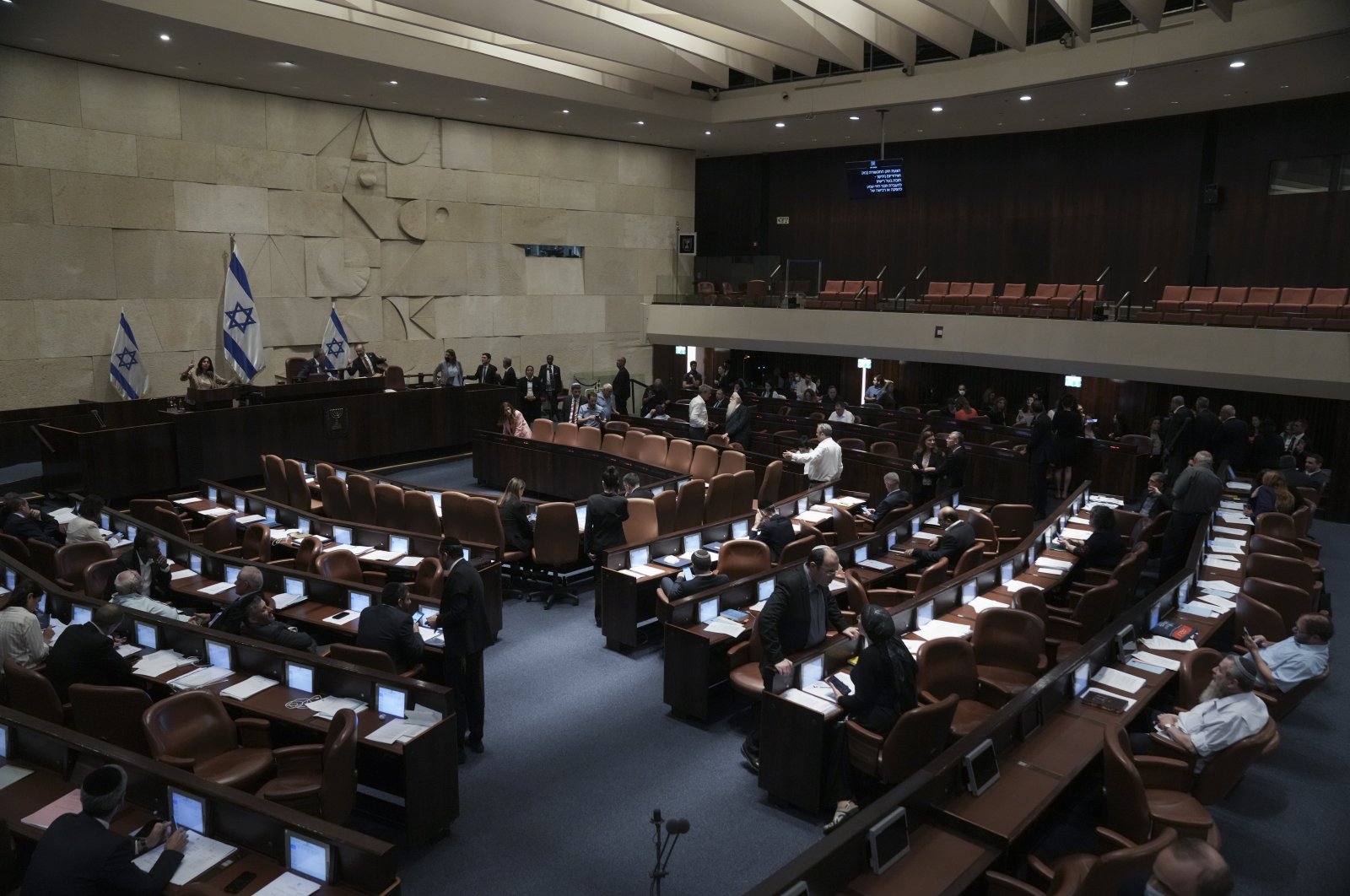 Lawmakers attend a preliminary vote on a bill to dissolve parliament, at the Knesset, Israel&#039;s parliament, in Jerusalem, June 22, 2022. (AP PHOTO) 