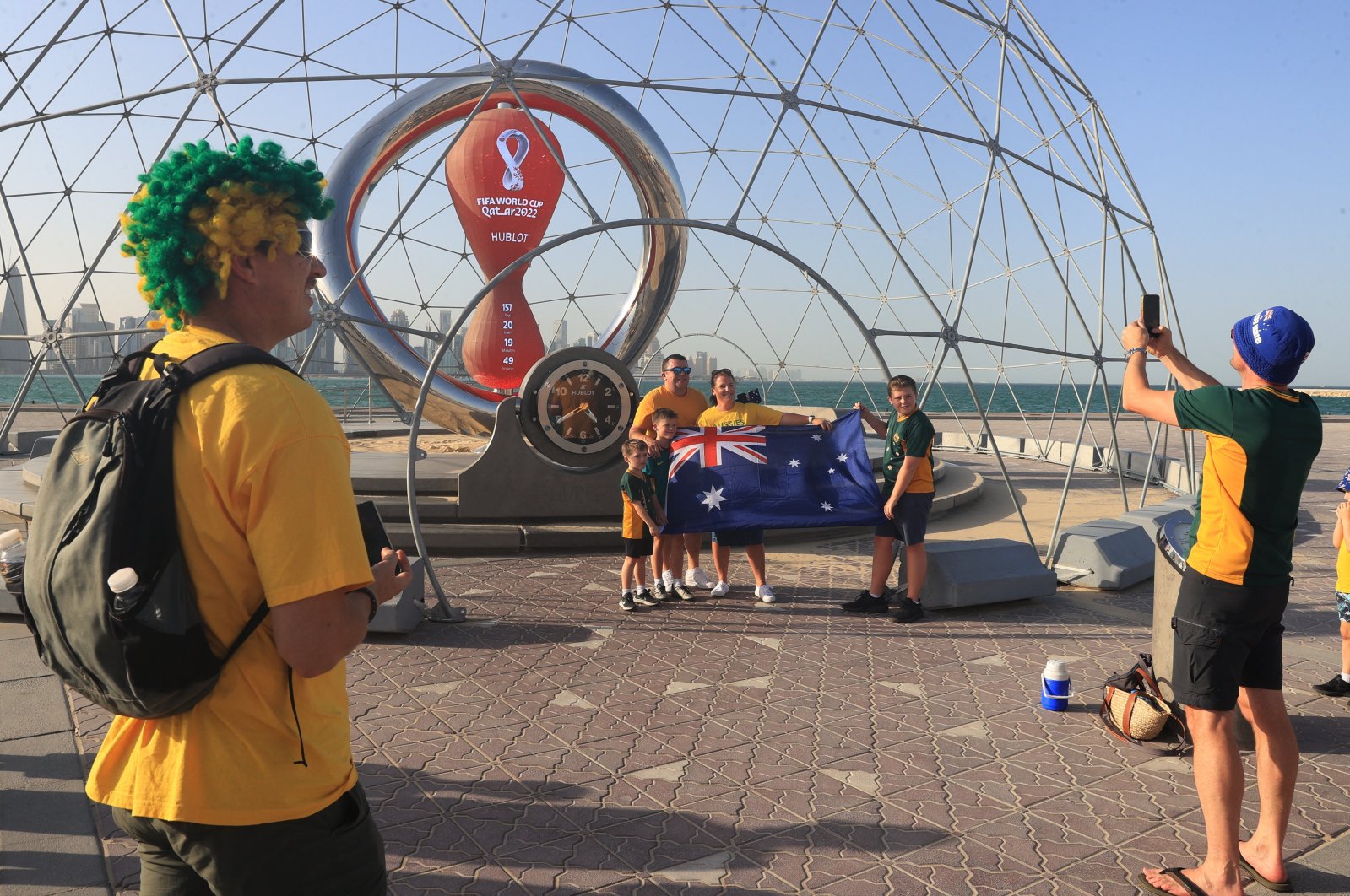 Australia fans are seen in front of the 2022 World Cup countdown clock, Doha, Qatar, June 16, 2022.