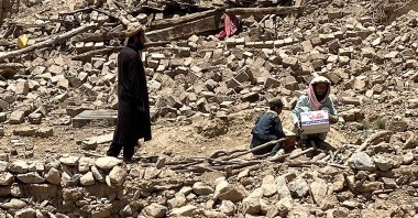 Men stand amid the rubble of damaged houses following an earthquake in Bermal district, in Paktika province, Afghanistan, June 23, 2022. (AP Photo)
