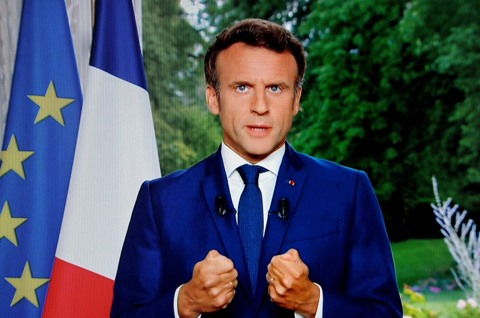 A photo of a TV screen shows French President Emmanuel Macron speaking during televised address in Paris, France, June 22, 2022. (AFP Photo)