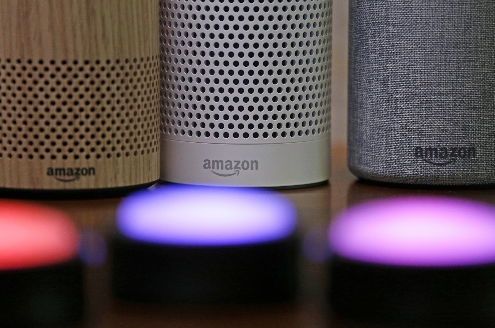 Amazon Echo and Echo Plus devices sit near illuminated Echo Button devices during an event by the company in Seattle, Washington, U.S., Sept. 27, 2017. (AP File Photo)