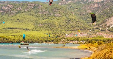 People kitesurfing in Akyaka, Muğla, Aug. 14, 2018. (Shutterstock Photo)