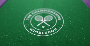 A Wimbledon umbrella is seen before a match Birmingham Classic match, Birmingham, England, June 18, 2022. (Reuters Photo)