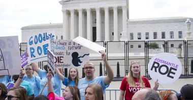 Demonstrators protest about abortion outside the Supreme Court in Washington, U.S., June 24, 2022. The Supreme Court has ended constitutional protections for abortion that had been in place for nearly 50 years in a decision by its conservative majority to overturn Roe v. Wade. Friday's outcome is expected to lead to abortion bans in roughly half the states. (AP Photo)