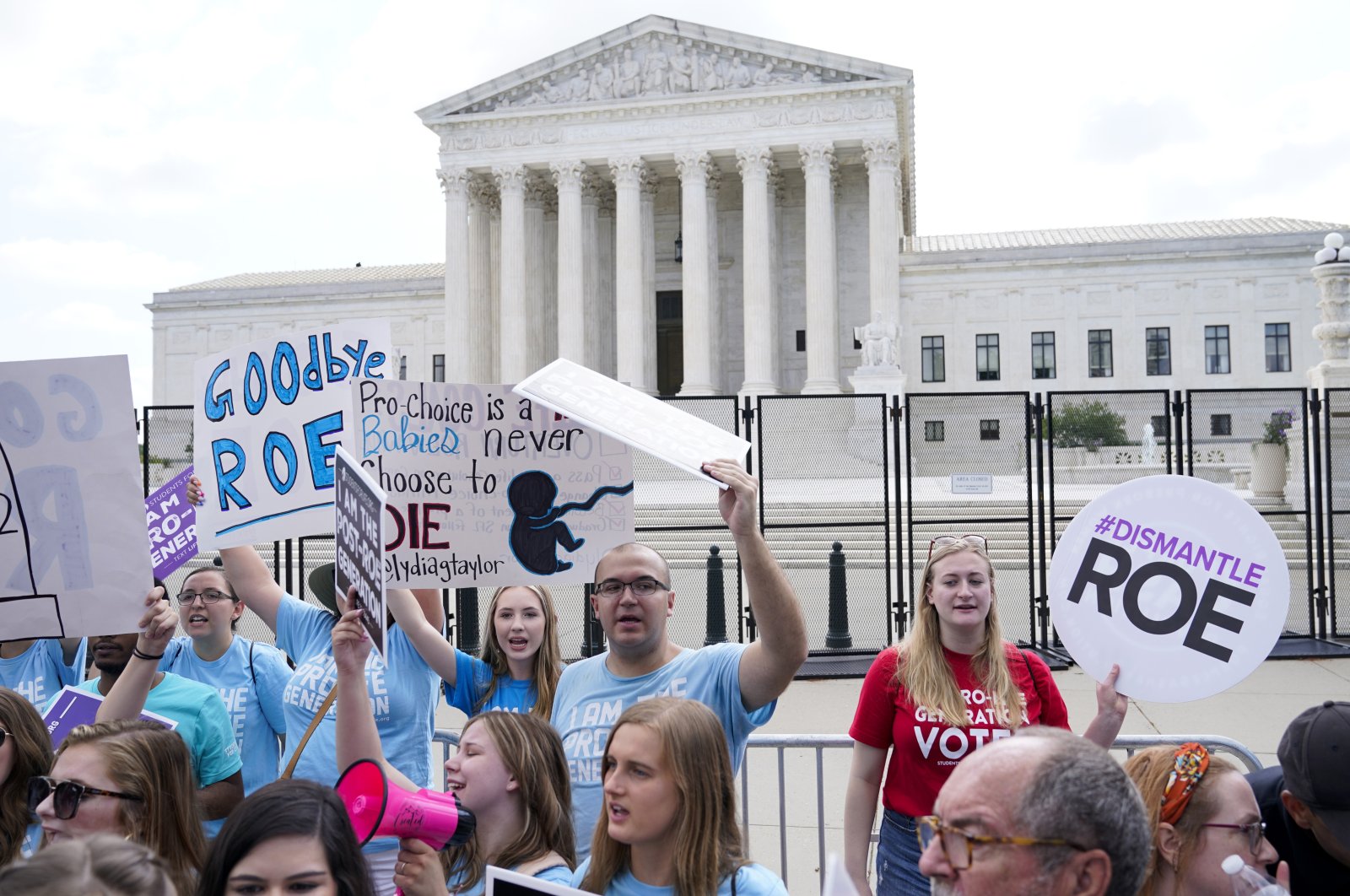 Demonstrators protest about abortion outside the Supreme Court in Washington, U.S., June 24, 2022. The Supreme Court has ended constitutional protections for abortion that had been in place for nearly 50 years in a decision by its conservative majority to overturn Roe v. Wade. Friday&#039;s outcome is expected to lead to abortion bans in roughly half the states. (AP Photo)