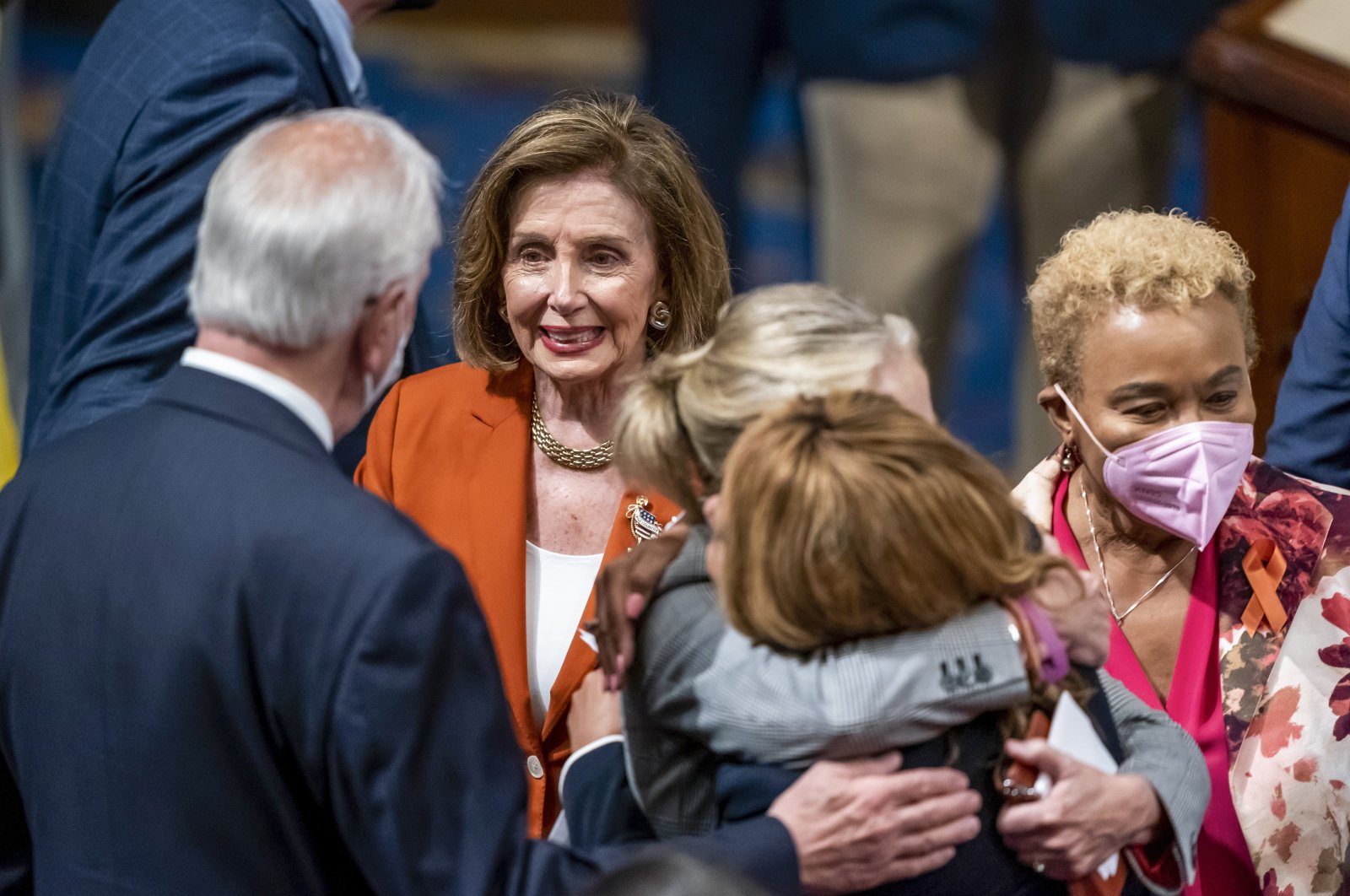Speaker of the House Nancy Pelosi, D-Calif., greets Rep. Mike Thompson, D-Calif., chairperson of the House Gun Violence Prevention Task Force (L) as Rep. Madeleine Dean, D-Penn., hugs Rep. Lucy McBath, D-Ga., with Rep. Barbara Lee, D-Calif. (R) after passage of the gun safety bill in the House, at the Capitol in Washington, June 24, 2022. (AP Photo)