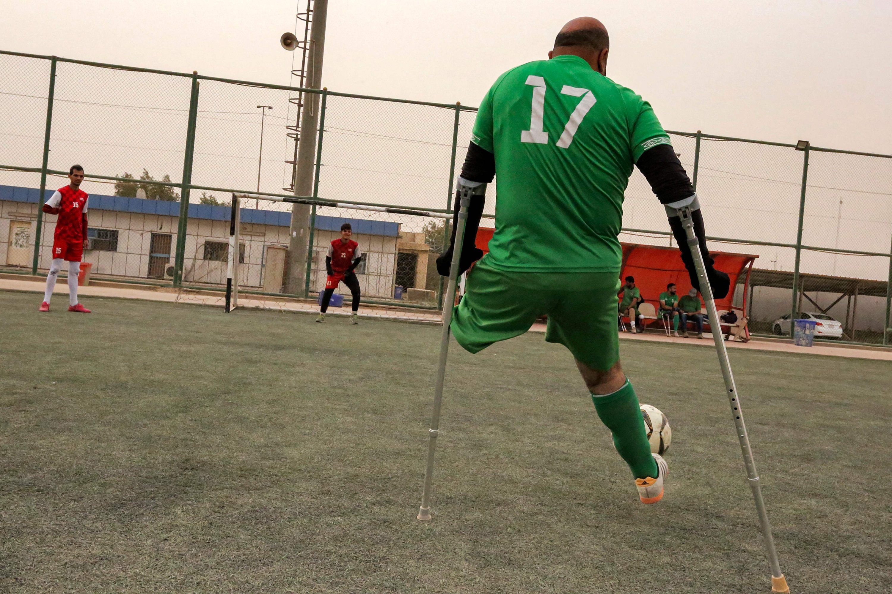 A member of the Iraqi national football team for amputees train in Baghdad, Iraq, May 10, 2022. (AFP Photo)