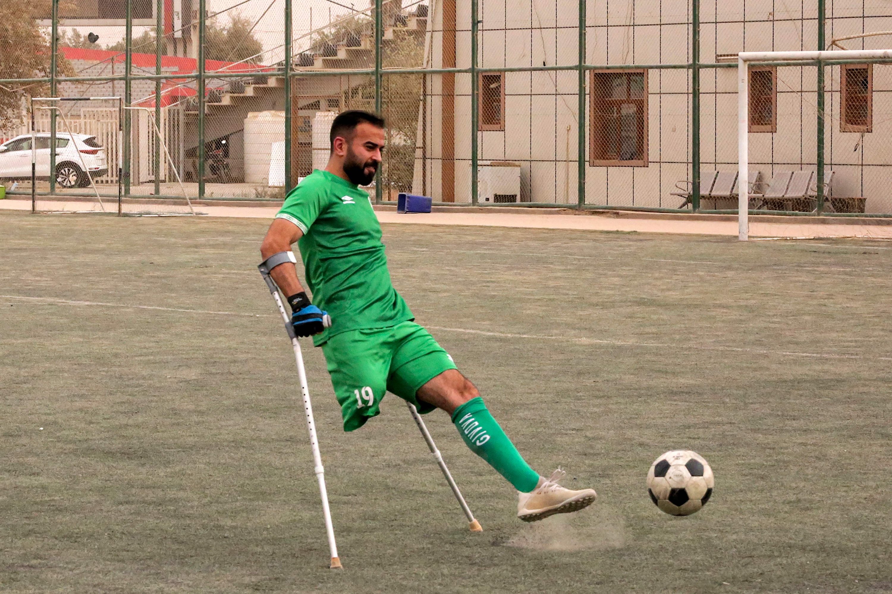 A member of the Iraqi national football team for amputees train in Baghdad, Iraq, May 10, 2022. (AFP Photo)