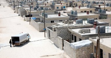 Syrians move into briquette houses in Idlib province, Syria, June 7, 2022. (DHA Photo)