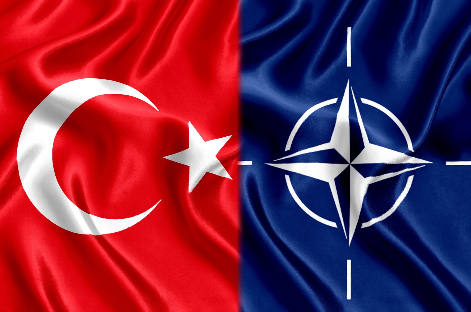 The flags of Turkey (L) and NATO are seen in this photo.(Shutterstock)