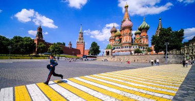 A Russian officer crosses the square in front of Saint Basil's Cathedral near The Kremlin in Moscow, Russia, June 25, 2022. (AFP Photo)