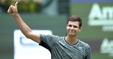 Poland's Hubert Hurkacz celebrates defeating Australia's Nick Kyrgiosat the ATP Tour men's singles semifinal, Halle, Germany, June 18, 2022. (AP Photo)