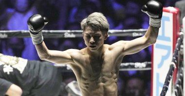 Japan&#039;s Naoya Inoue celebrates defeating the Philippines&#039; Nonito Donaire, Saitama, Japan, June 7, 2022. (AP Photo)