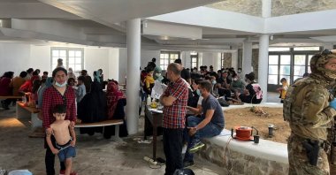 Migrants are seen in a shelter on the island of Mykonos, Greece, June 19, 2022. (Reuters)