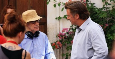 Director Woody Allen and Alec Baldwin speak during the filming of "To Rome With Love," at Piazza Madonna Dei Monti, Rome, Italy, July 26, 2011. (Getty Images)