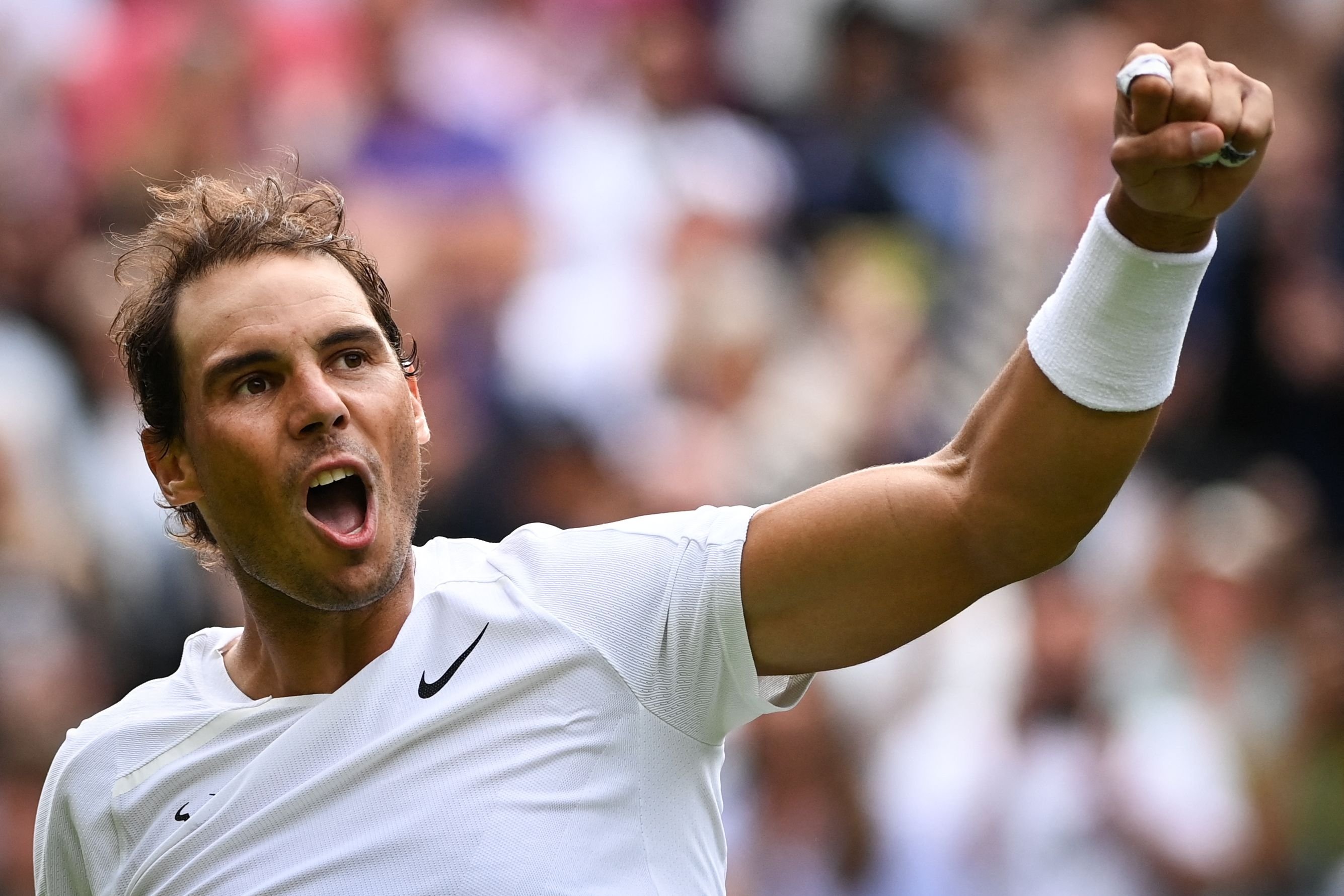 Spain's Rafael Nadal celebrates his win over Argentina's Francisco Cerundolo at the end of their Wimbledon Championships men's singles match, London, England, June 28, 2022. (AFP Photo)