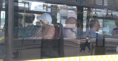 People wearing protective masks against COVID-19 in a bus, in Istanbul, Turkey, May 30, 2022. (İHA PHOTO) 
