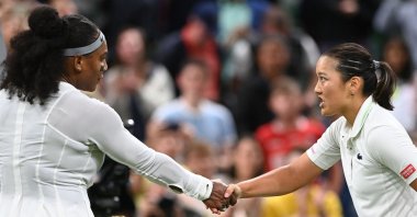 France's Harmony Tan (R) shakes hands with U.S.' Serena Williams after winning their Wimbledon Championships women's singles match, London, England, June 28, 2022. (AFP Photo)