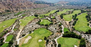An aerial view of the Angeles National Golf Club, a public facility in the Sunland neighborhood where drought restrictions are being imposed on golf courses, Los Angeles, California, U.S., June 14, 2022. (AFP Photo)