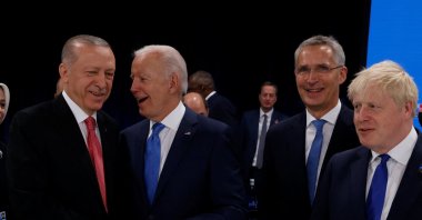 President Recep Tayyip Erdoğan (L), U.S. President Joe Biden (2nd L), NATO Secretary-General Jens Stoltenberg (2nd R) and British Prime Minister Boris Johnson attend the round table of the first meeting of a NATO summit in Madrid, Spain, June 29, 2022. (REUTERS)