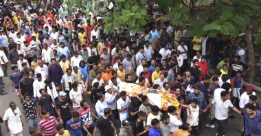 People participate in the funeral procession of tailor Kanhaiya Lal in Udaipur, India, June 29, 2022. (AP Photo).