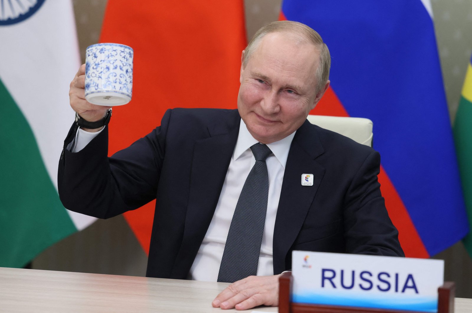 Russian President Vladimir Putin makes a toast as he takes part in the XIV BRICS summit in virtual format, Moscow, Russia, June 23, 2022. (AFP Photo)
