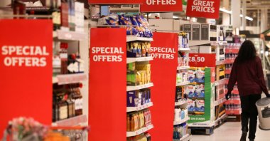 An employee walks inside a Sainsbury&#039;s supermarket in Richmond, London, Britain, June 27, 2022. (Reuters Photo)