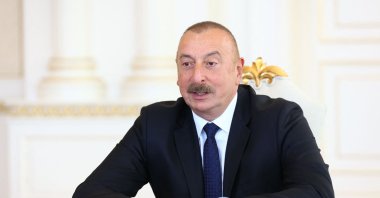 Azerbaijan's President Ilham Aliyev speaking with the Russia's foreign minister during their meeting in Baku, Azerbaijan, June 23, 2022. (Russian Foreign Ministry via AFP Photo)