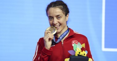 Bediha Gün celebrates winning gold in the 57-kg final at the Mediterranean Games, Oran, Algeria, June 29, 2022. (AA Photo)