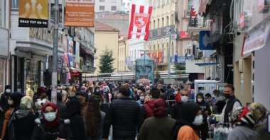 People walk on a street in Samsun, northern Turkey, June 18, 2022. (İHA PHOTO)