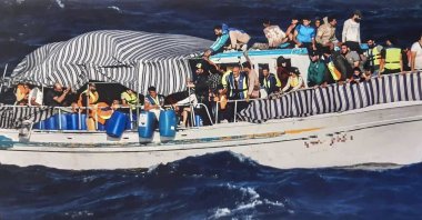 Migrants on a boat during a search and rescue operation off Karpathos island, Greece, June 28, 2022. (AFP)