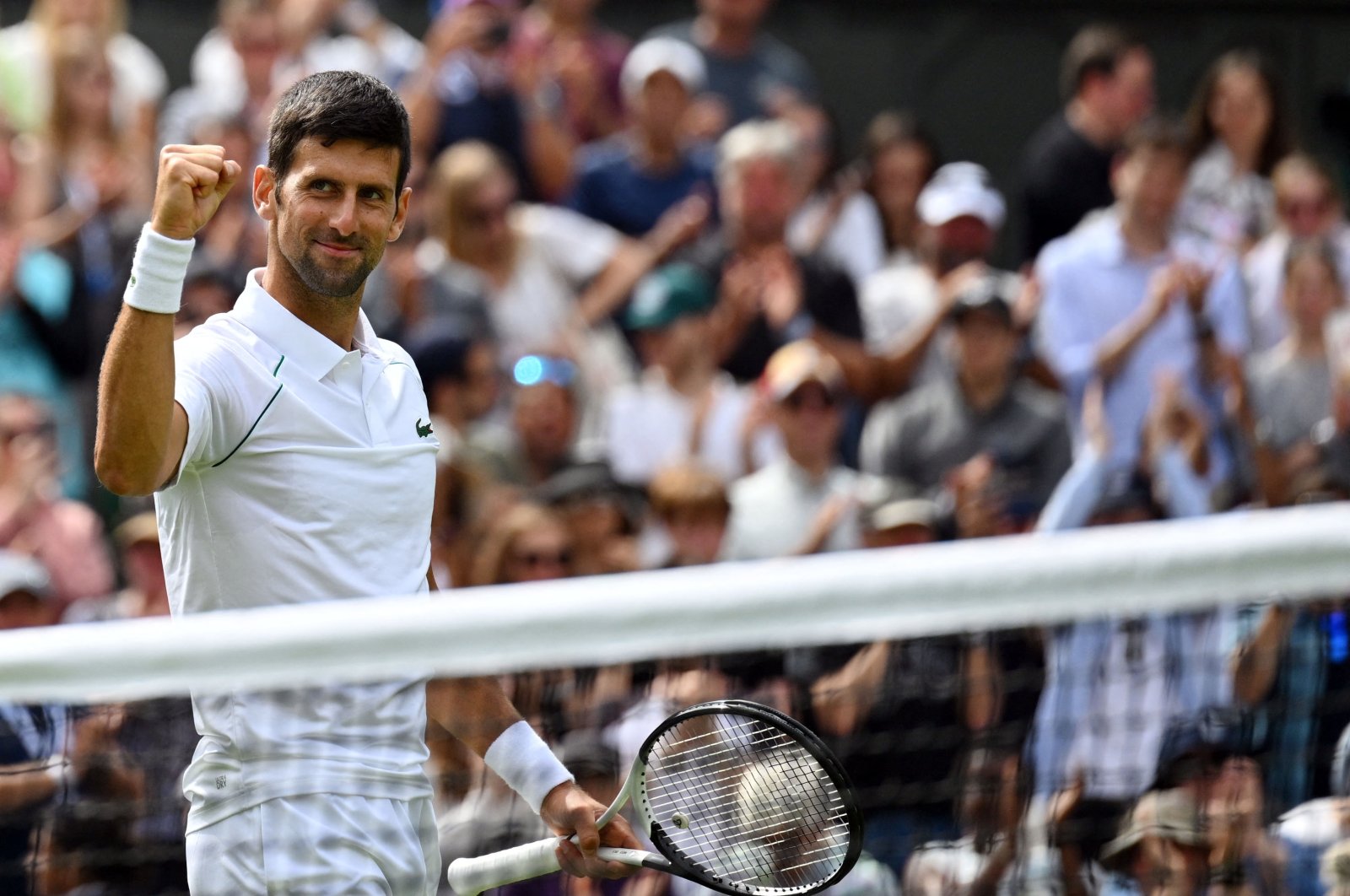Novak Djokovic celebrates winning his Wimbledon second-round match against Thanasi Kokkinakis, London, England, June 29, 2022. (AFP Photo) 