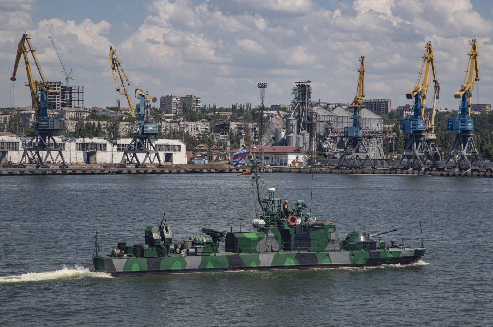 A picture taken during a visit to Mariupol organized by the Russian military shows a Russian navy ship on guard in the cargo sea port of Mariupol, Ukraine, June 12, 2022. (EPA Photo)