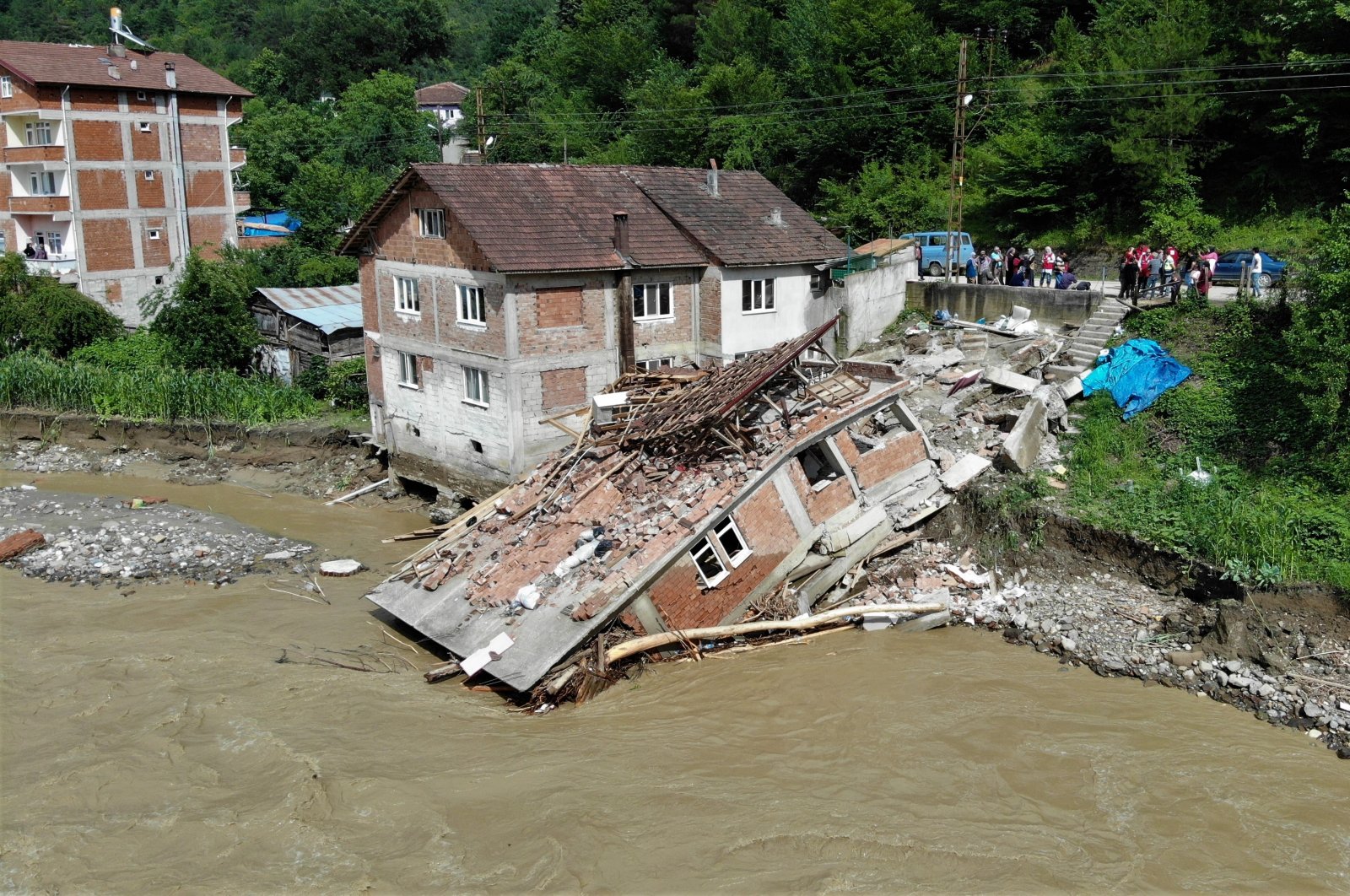 A view of a collapsed house during recent floods, in Karabük, northern Turkey, June 29, 2022. (İHA PHOTO)