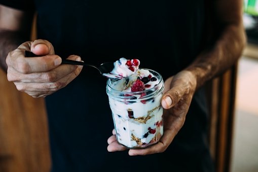 Frozen yogurt with biscuits and berries. (Getty Images)