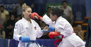 Turkish player Tuba Yakan (L) confronts Greek Cyprus' Arianne Miles Gonzales in Mediterranean Games, in Oran, Algeria, June 26, 2022. (AA PHOTO)