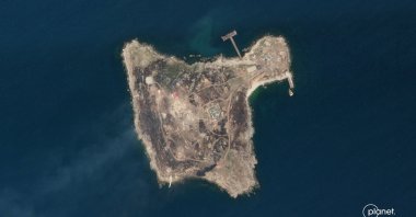 This handout satellite photo taken and released by Planet Labs PBC on June 30, 2022, shows Snake Island in the Black Sea. (Photo by Planet Labs PBC / AFP) 