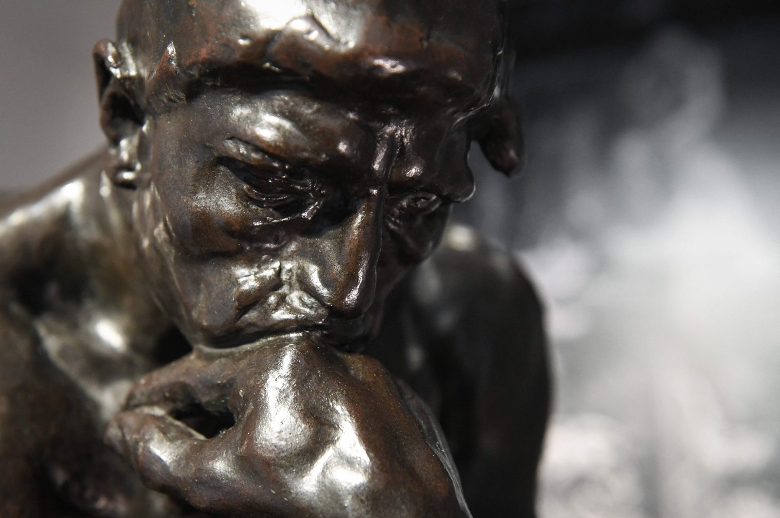This photograph taken on June 28, 2022, shows a copy of &#039;The Thinker,&#039; a sculpture by French artist Auguste Rodin (1840-1917) on display in Paris, France. (AFP)