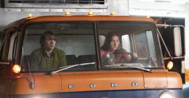 This image released by MGM shows Cooper Hoffman (L) and Alana Haim in a scene from the film "Licorice Pizza." (AP Photo)