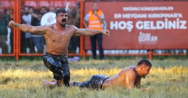 Cengizhan Şimşek (L) celebrates winning the top title at the 661st Kırkpınar Oil Wrestling Festival, Edirne, Turkey, July 3, 2022. (AA Photo)