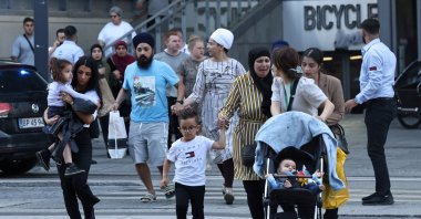 People leave Field's shopping center after Danish police said they received reports of a shooting, Copenhagen, Denmark, July 3, 2022. (Reuters Photo)