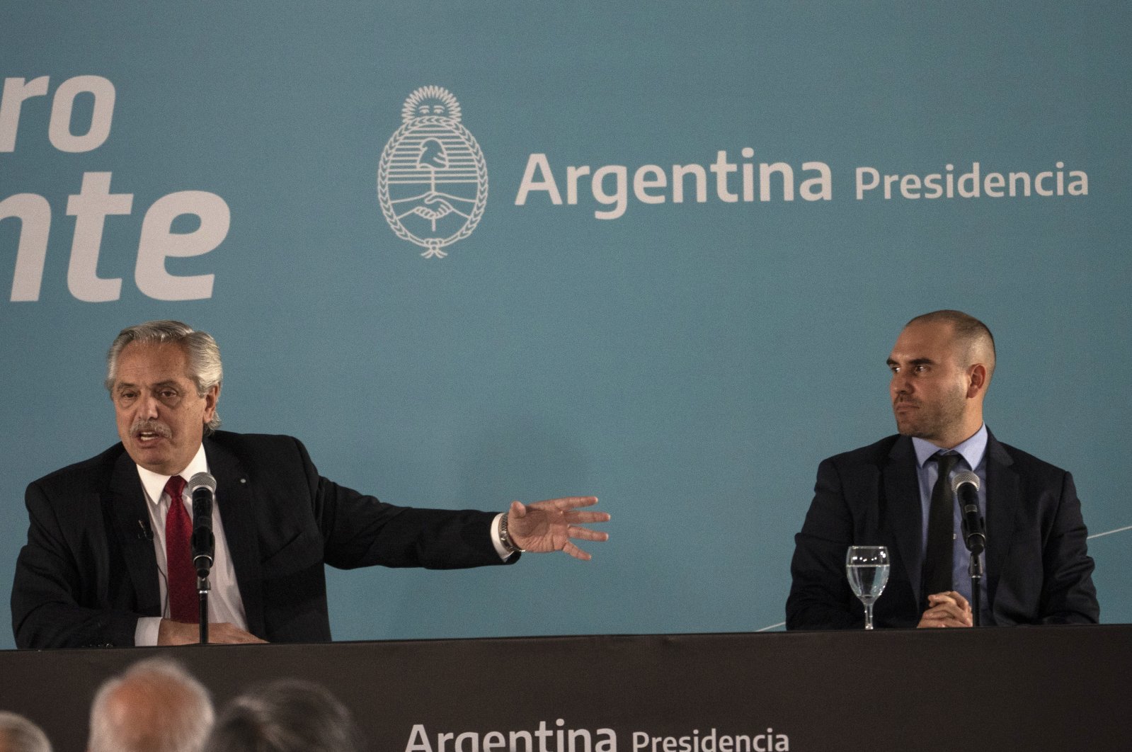 Argentinian President Alberto Fernandez (L) speaks next to then-Economy Minister Martin Guzman during an announcement in Buenos Aires, Argentina, June 6, 2022. (AP Photo)