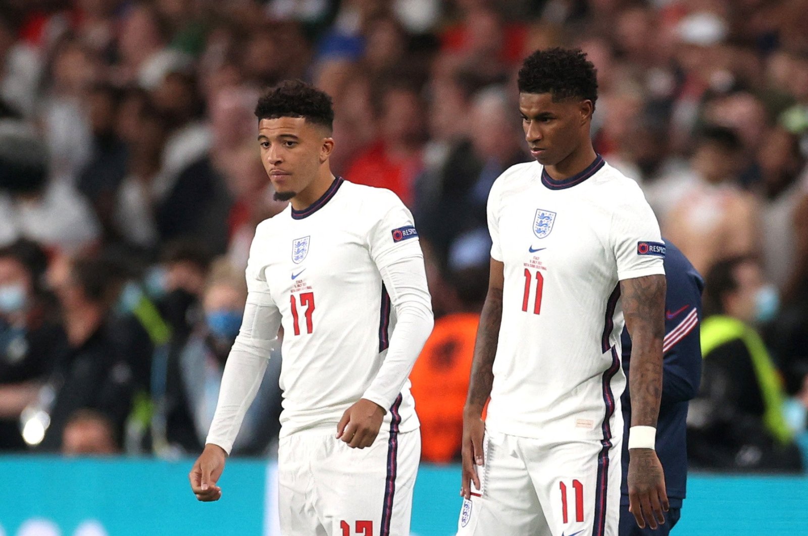 Marcus Rashford (L) and Jadon Sancho (R), seen here in a match in London, Britain, July 11, 2021, have been the victims of online racist abuse. (REUTERS PHOTO)