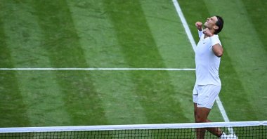 Spain's Rafael Nadal celebrates beating Netherlands' Botic Van De Zandschulp during their round of 16 men's singles tennis match on the eighth day of the 2022 Wimbledon Championships at The All England Tennis Club in Wimbledon, southwest London, July 4, 2022. (AFP Photo)