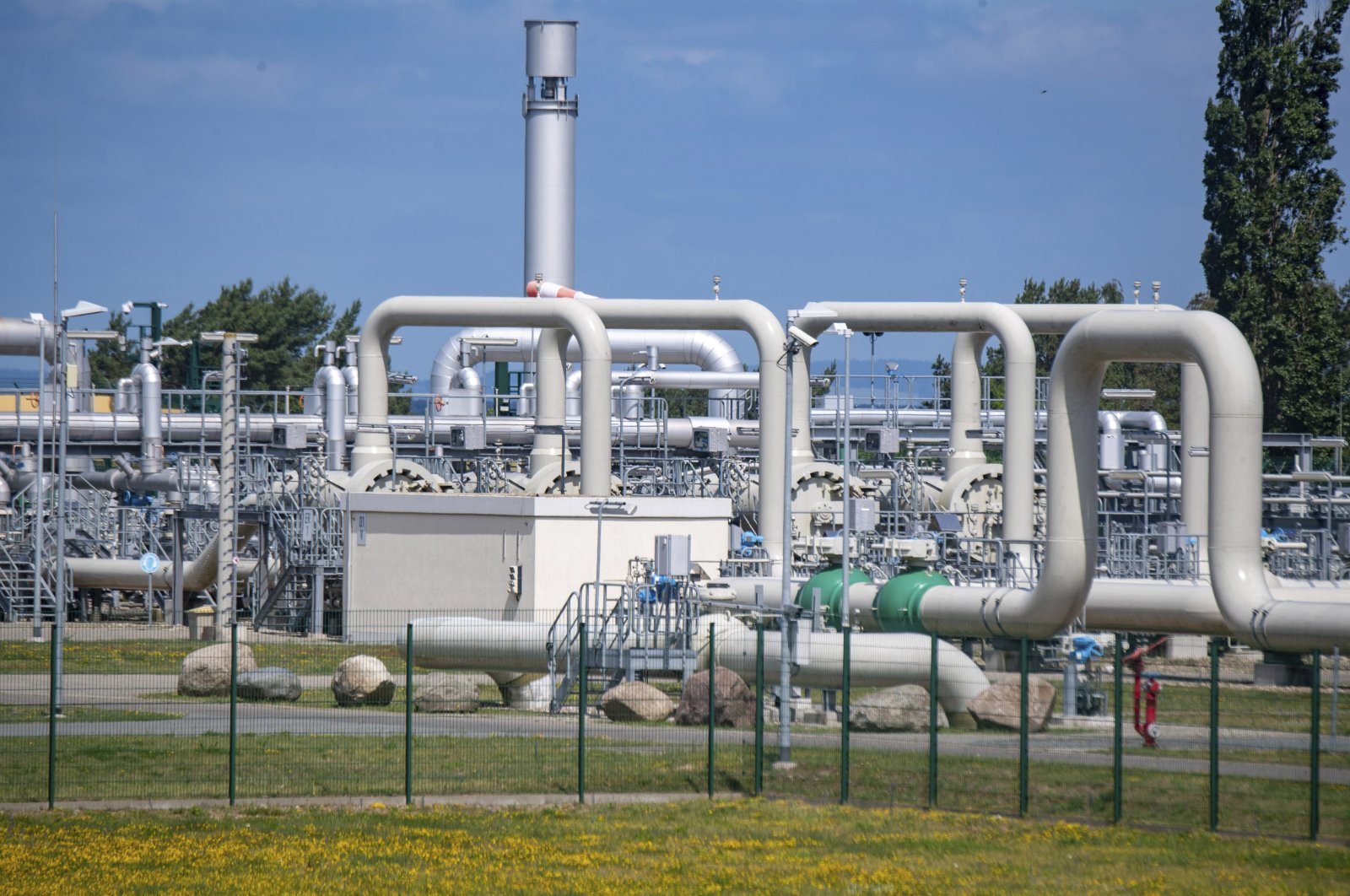Pipe systems and shut-off devices at the gas receiving station of the Nord Stream 1 Baltic Sea pipeline and the transfer station of the OPAL long-distance gas pipeline in Lubmin, Germany, June 21, 2022. (AP Photo)